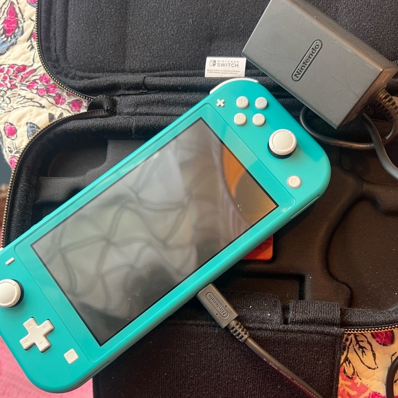 Nintendo Switch Lite in Turquoise. Compact and portable nintendo